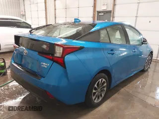 2021 Toyota Prius L Eco with VIN JTDKAMFU9M3135117, listed as a IAAI auction lot 41579736 with 35,795 mi miles and . Bid and sale history available at DreamBid. Image 4.
