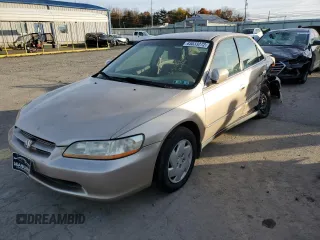 2000 Honda Accord LX z VIN 1HGCG1642YA084841, wystawiony jako Copart lot #72237974 z przebiegiem Nie podano mil oraz Szkoda całkowita • Salvage title. Historia ofert i sprzedaży dostępna na DreamBid. Obrazek 1.