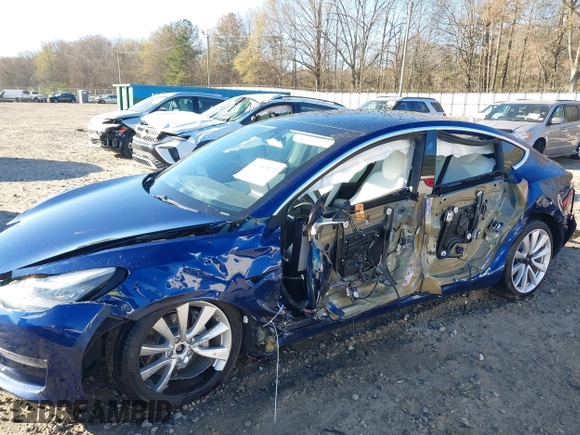 2019 Tesla Model 3 Long Range with VIN 5YJ3E1EB7KF454636, listed as a IAAI auction lot 41853972 with 56,916 mi miles. Bid and sale history available at carsss.com. Image 6.