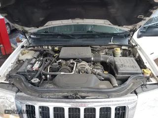 2004 Jeep Grand Cherokee Limited with VIN 1J8GW58N74C380204, listed as a IAAI auction lot 41756657 with 239,697 mi miles. Bid and sale history available at carsss.com. Image 10.
