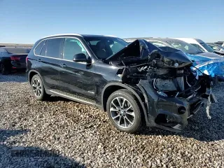 2017 BMW X5 xDrive35i z VIN 5UXKR0C35H0V73944, wystawiony jako Copart lot #43057465 z przebiegiem 90 571 mil mil oraz Szkoda całkowita • Salvage title. Historia ofert i sprzedaży dostępna na DreamBid. Obrazek 13.
