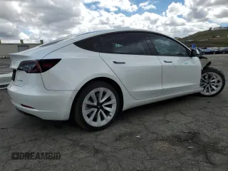 2022 Tesla Model 3 Long Range z VIN 5YJ3E1EB7NF365962, wystawiony jako Copart lot #48601865 z przebiegiem 121 541 mil mil oraz Szkoda całkowita • Salvage title. Historia ofert i sprzedaży dostępna na DreamBid. Obrazek 3.