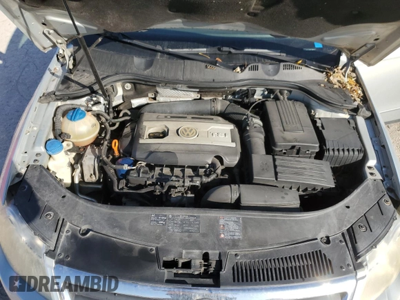 2009 Volkswagen Passat z VIN WVWXK73C99E046868, wystawiony jako Copart lot #79549784 z przebiegiem 167 784 mil mil oraz Szkoda całkowita • Salvage title. Historia ofert i sprzedaży dostępna na DreamBid. Obrazek 11.