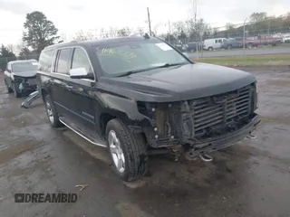 2017 Chevrolet Suburban Premier z VIN 1GNSCJKC2HR360964, wystawiony jako IAAI lot #41962373 z przebiegiem 127 060 mil mil oraz . Historia ofert i sprzedaży dostępna na DreamBid. Obrazek 1.