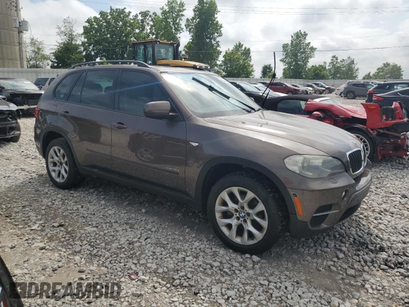 2012 BMW X5 35i with VIN 5UXZV4C51CL748765, listed as a Copart auction lot 62339905 with Not provided miles and Clean title. Bid and sale history available at DreamBid. Image 4.