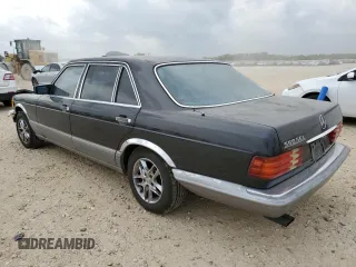 1987 Mercedes-Benz 560 with VIN WDBCA39DXHA343601, listed as a Copart auction lot 53922265 with 263,600 mi miles and Clean Title. Bid and sale history available at DreamBid. Image 2.