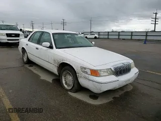 1999 Mercury Grand Marquis LS с VIN 2MEFM75W6XX619412, выставлен на аукционе Copart как лот 51939515 с пробегом 131 784 миль миль и Списание • Salvage title. История ставок и продаж доступна на DreamBid. Изображение 10.