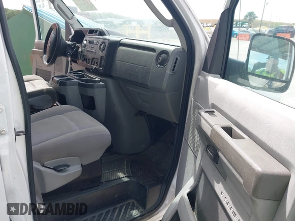 2011 Ford Econoline Cargo Commercial with VIN 1FTNE2EW3BDA57353, listed as a IAAI auction lot 42212797 with 234,806 mi miles and . Bid and sale history available at carsss.com. Image 5.