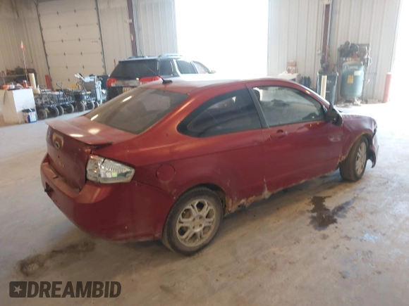 2009 Ford Focus SE with VIN 1FAHP32N49W222419, listed as a IAAI auction lot 42113655 with 238,936 mi miles. Bid and sale history available at carsss.com. Image 4.
