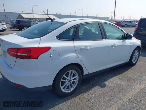 2017 Ford Focus SE with VIN 1FADP3F27HL206567, listed as a IAAI auction lot 42472315 with 155,614 mi miles and . Bid and sale history available at DreamBid. Image 4.