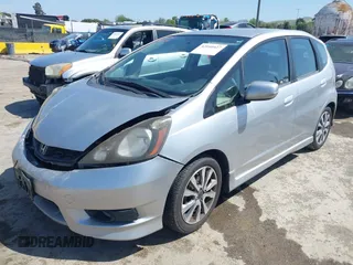 2013 Honda Fit Sport with VIN JHMGE8H51DC005760, listed as a IAAI auction lot 42040427 with 184,375 mi miles. Bid and sale history available at carsss.com. Image 18.