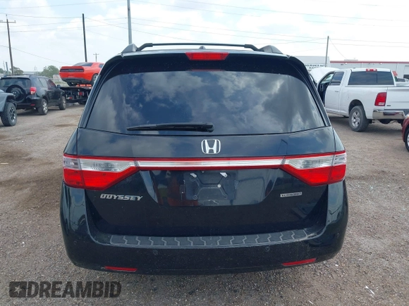 2013 Honda Odyssey Touring with VIN 5FNRL5H95DB086041, listed as a IAAI auction lot 42477974 with 213,343 mi miles and . Bid and sale history available at DreamBid. Image 16.