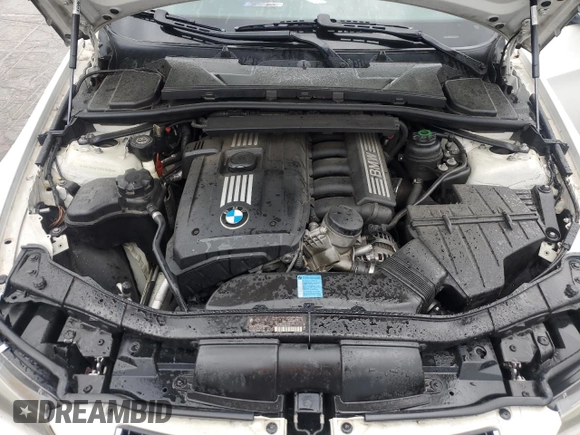2007 BMW 3 Series 328i z VIN WBAVA335X7KX76319, wystawiony jako Copart lot #57342215 z przebiegiem 176 016 mil mil oraz Szkoda całkowita • Salvage title. Historia ofert i sprzedaży dostępna na DreamBid. Obrazek 11.