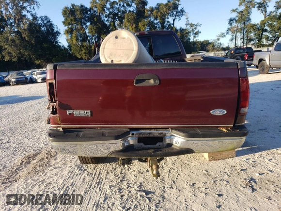 2000 Ford F-250 XL with VIN 1FTNX21L6YEE29549, listed as a Copart auction lot 74982324 with 133,883 mi miles and Salvage title. Bid and sale history available at DreamBid. Image 6.
