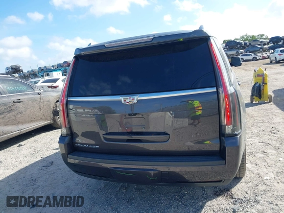 2017 Cadillac Escalade Premium Luxury z VIN 1GYS4CKJ5HR293450, wystawiony jako IAAI lot #41951478 z przebiegiem 51 882 mil mil oraz . Historia ofert i sprzedaży dostępna na DreamBid. Obrazek 17.
