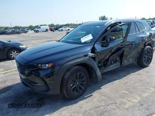 2025 Mazda CX-50 S Premium z VIN 7MMVABDM6SN348791, wystawiony jako IAAI lot #42340944 z przebiegiem 6202 mil mil oraz . Historia ofert i sprzedaży dostępna na DreamBid. Obrazek 2.