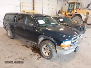2003 Dodge Dakota SLT with VIN 1D7HL48N63S177233, listed as a IAAI auction lot 42167711 with 163,511 mi miles and . Bid and sale history available at carsss.com. Image 1.