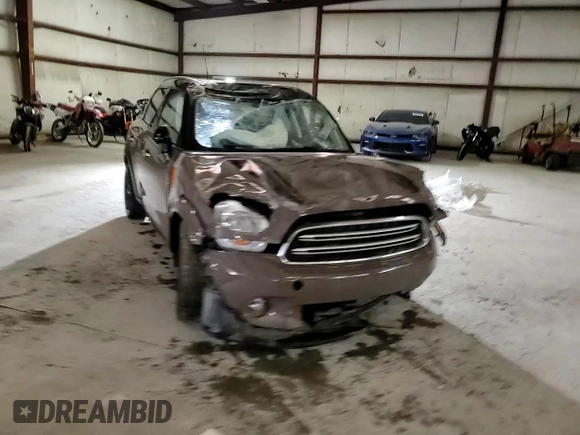 2015 MINI Countryman with VIN WMWZB3C52FWR44105, listed as a Copart auction lot 86780484 with Not Provided miles and Salvage Title. Bid and sale history available at DreamBid. Image 11.