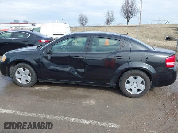 2010 Dodge Avenger SXT with VIN 1B3CC4FB3AN142126, listed as a IAAI auction lot 41709936 with 245,258 mi miles. Bid and sale history available at carsss.com. Image 14.