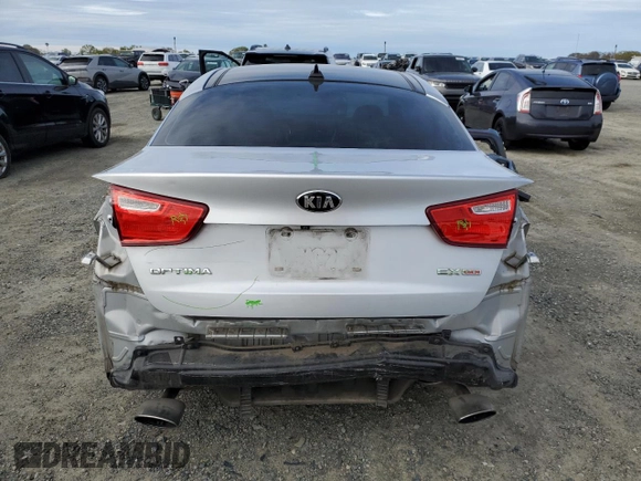 2015 Kia Optima EX with VIN 5XXGN4A75FG505073, listed as a Copart auction lot 50218595 with 77,199 mi miles and Salvage Title. Bid and sale history available at carsss.com. Image 6.