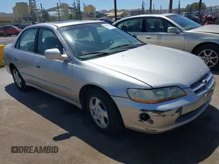 1999 Honda Accord EX z VIN 1HGCG5559XA033546, wystawiony jako IAAI lot #42152362 z przebiegiem 242 440 mil mil oraz . Historia ofert i sprzedaży dostępna na DreamBid. Obrazek 1.