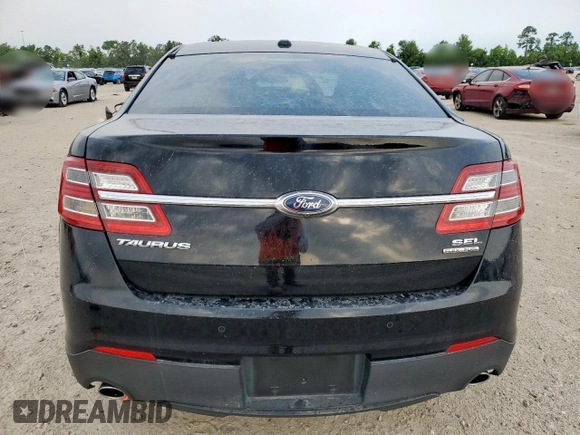 2018 Ford Taurus SEL z VIN 1FAHP2E87JG136553, wystawiony jako Copart lot #57759635 z przebiegiem 33 464 mil mil oraz Szkoda całkowita • Salvage title. Historia ofert i sprzedaży dostępna na DreamBid. Obrazek 6.