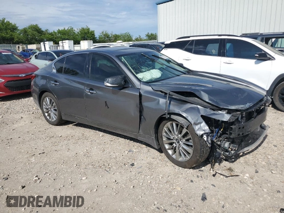 2018 Infiniti Q50 Luxe with VIN JN1EV7AR1JM430839, listed as a Copart auction lot 57727515 with 89,476 mi miles and Salvage title. Bid and sale history available at DreamBid. Image 4.