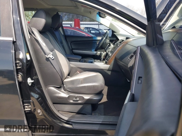 2011 Mazda CX-9 Grand Touring with VIN JM3TB3DA5B0300784, listed as a IAAI auction lot 41816110 with 138,523 mi miles and . Bid and sale history available at DreamBid. Image 5.