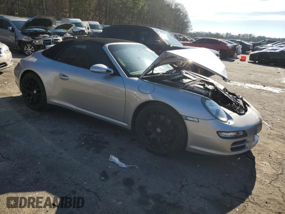 2008 Porsche 911 Carrera S z VIN WP0CB29998S776812, wystawiony jako Copart lot #86967074 z przebiegiem Nie podano mil oraz Szkoda całkowita • Salvage title. Historia ofert i sprzedaży dostępna na DreamBid. Obrazek 4.