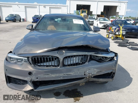 2018 BMW 4 Series 440i with VIN WBA4J5C54JBF07315, listed as a IAAI auction lot 41738540 with 74,577 mi miles and . Bid and sale history available at DreamBid. Image 12.