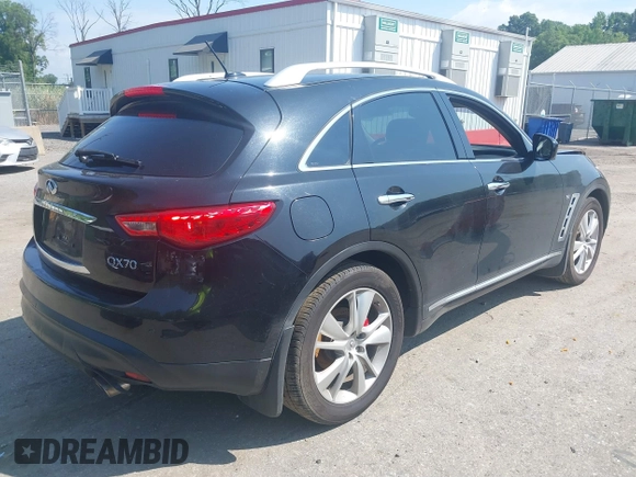 2014 Infiniti QX70 with VIN JN8CS1MW7EM410150, listed as a IAAI auction lot 39960321 with Not Provided miles and . Bid and sale history available at DreamBid. Image 4.