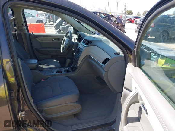 2015 Chevrolet Traverse LS z VIN 1GNKVFED7FJ203566, wystawiony jako IAAI lot #41783373 z przebiegiem 147 309 mil mil oraz . Historia ofert i sprzedaży dostępna na DreamBid. Obrazek 5.