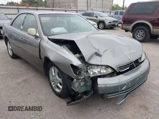 2001 Lexus ES 300 with VIN JT8BF28G210304595, listed as a IAAI auction lot 41885816 with 266,853 mi miles. Bid and sale history available at carsss.com. Image 1.
