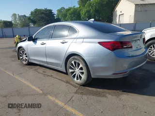 2016 Acura TLX with VIN 19UUB1F38GA002104, listed as a IAAI auction lot 41998966 with 124,159 mi miles. Bid and sale history available at carsss.com. Image 3.