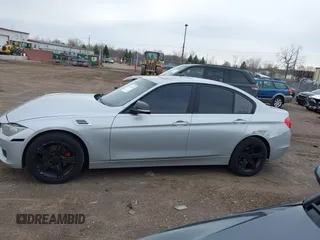 2014 BMW 3 Series 320i xDrive with VIN WBA3C3C58EP661364, listed as a IAAI auction lot 41947049 with 211,982 mi miles and . Bid and sale history available at DreamBid. Image 14.