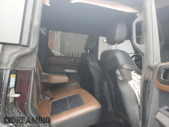 2023 Ford Bronco z VIN 1FMEE5DP3PLB59482, wystawiony jako Copart lot #59725815 z przebiegiem 54 741 mil mil oraz Szkoda całkowita • Salvage title. Historia ofert i sprzedaży dostępna na DreamBid. Obrazek 11.