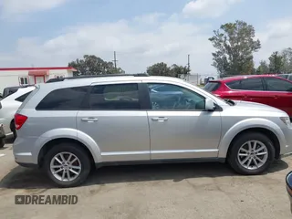 2013 Dodge Journey SXT with VIN 3C4PDCBG9DT506384, listed as a IAAI auction lot 42119685 with 143,769 mi miles. Bid and sale history available at carsss.com. Image 14.