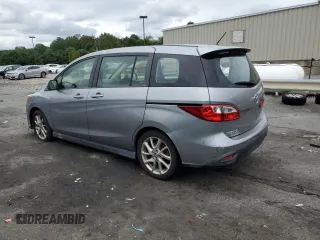 2014 Mazda 5 Touring with VIN JM1CW2CL6E0174143, listed as a Copart auction lot 68129294 with 105,764 mi miles and Salvage Title. Bid and sale history available at carsss.com. Image 2.