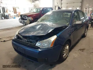 2009 Ford Focus SE with VIN 1FAHP35N09W245448, listed as a IAAI auction lot 41850771 with 233,531 mi miles. Bid and sale history available at carsss.com. Image 2.