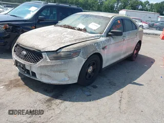 2013 Ford Police Interceptor with VIN 1FAHP2M80DG205024, listed as a IAAI auction lot 42740282 with 123,705 mi miles and . Bid and sale history available at DreamBid. Image 2.