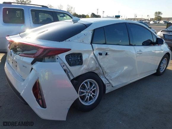 2020 Toyota Prius Prime LE with VIN JTDKARFP5L3145861, listed as a IAAI auction lot 41808638 with 83,362 mi miles. Bid and sale history available at carsss.com. Image 4.