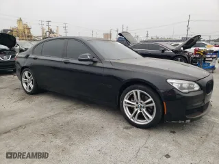2013 BMW 7 Series 740Li with VIN WBAYE4C51DD137687, listed as a Copart auction lot 76103944 with 134,609 mi miles and Salvage Title. Bid and sale history available at carsss.com. Image 4.