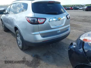 2015 Chevrolet Traverse LT with VIN 1GNKRHKD1FJ359123, listed as a IAAI auction lot 42247341 with 180,189 mi miles and . Bid and sale history available at DreamBid. Image 3.