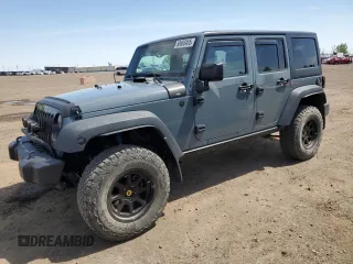 2014 Jeep Wrangler Unlimited Sahara z VIN 1C4BJWEG7EL228307, wystawiony jako Copart lot #58663455 z przebiegiem 188 024 mil mil oraz Szkoda całkowita • Salvage title. Historia ofert i sprzedaży dostępna na DreamBid. Obrazek 1.