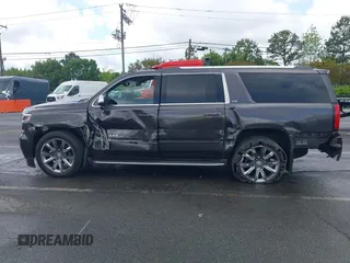 2015 Chevrolet Suburban LTZ with VIN 1GNSKKKC4FR589913, listed as a IAAI auction lot 42017190 with 216,145 mi miles. Bid and sale history available at carsss.com. Image 14.