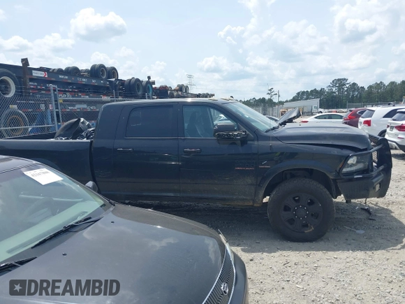 2018 Ram 2500 Laramie with VIN 3C6UR5NLXJG256688, listed as a IAAI auction lot 42168537 with 214,596 mi miles and . Bid and sale history available at DreamBid. Image 13.