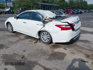 2017 Nissan Altima SL with VIN 1N4AL3AP1HC221163, listed as a IAAI auction lot 42191635 with 65,000 mi miles and . Bid and sale history available at DreamBid. Image 3.