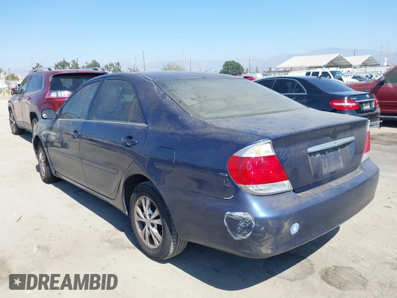 2005 Toyota Camry LE with VIN 4T1BF32K25U101690, listed as a IAAI auction lot 40453083 with 246,087 mi miles and . Bid and sale history available at DreamBid. Image 3.