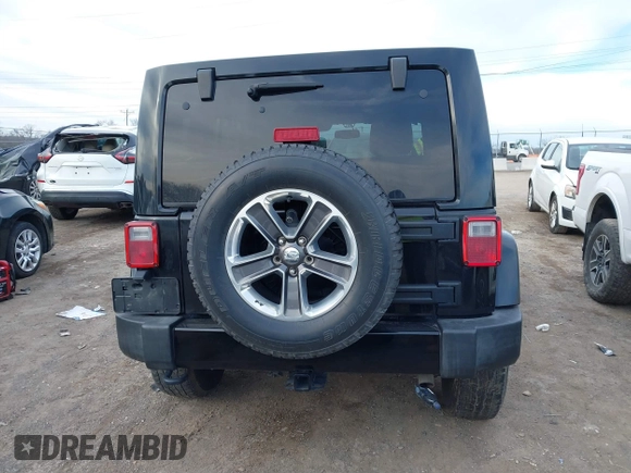 2016 Jeep Wrangler Unlimited 75th Anniversary with VIN 1C4BJWEG1GL221873, listed as a IAAI auction lot 41635788 with 148,493 mi miles. Bid and sale history available at carsss.com. Image 17.