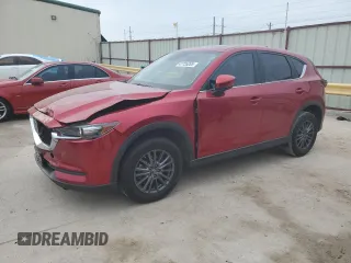 2020 Mazda CX-5 Touring with VIN JM3KFACM2L1834465, listed as a Copart auction lot 47735205 with 86,096 mi miles and Salvage Title. Bid and sale history available at carsss.com. Image 1.